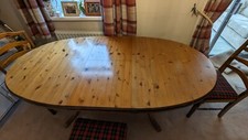 Ducal extendable table and three matching chairs.