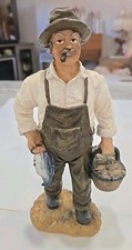 Vintage fisherman figurine 10"