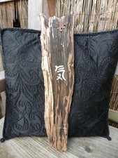 hand carved driftwood wall