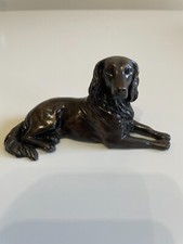 Spaniel lying statue