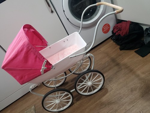 White and pink hood - and, pram