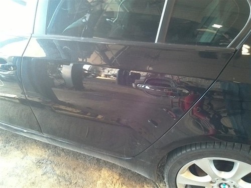Used rear left door assembly - rear,