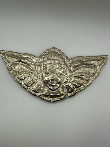 Pressed metal angel face wings - pressed,