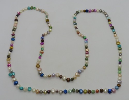 Stained cultured pearl - ..,