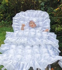 "Treasure Forever" designer pure white lace trimmed faux silk pram quilt.