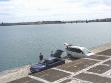 Photo 6x4 Fishing off the