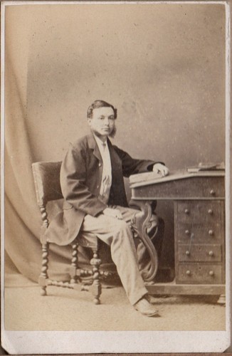 Young man desk davenport - at,
