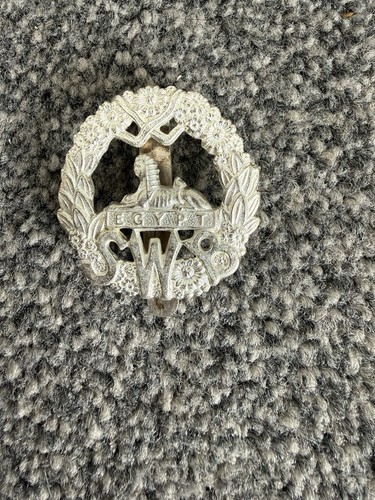 Cap badge for the - badge,