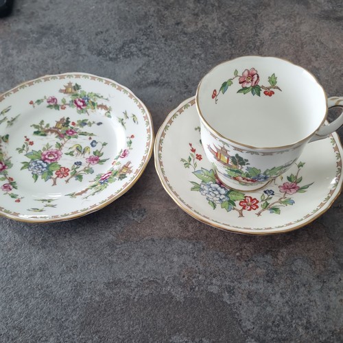 Teacup and saucer side - and,