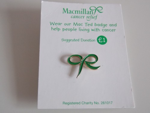 Macmillan cancer relief pin - relief,