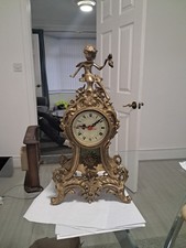 Beautiful brass boulle style mantel clock, Very Heavy With The Sun God Inside 
