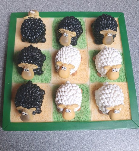 Novelty tic tac toe - black, and