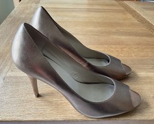 Jones Bootmaker. Metallic Gold