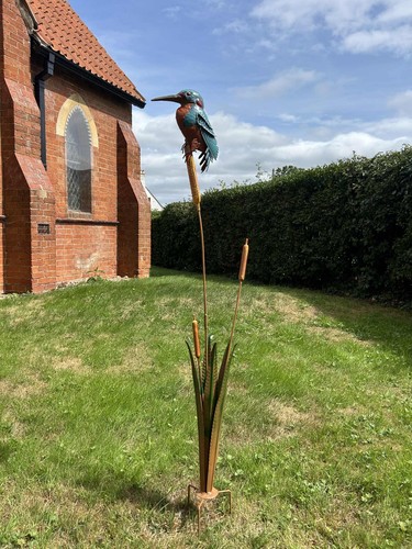 Metal kingfisher and reeds - and,