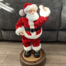 vintage? singing,animated booty shaking santa figure up on the housetop