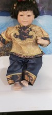ORIENTAL CHINESE DOLL IN NATIONAL DRESS PORCELAIN