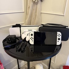 Nintendo Switch OLED White Handheld Console Bundle