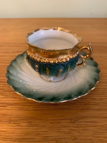 Old cup saucer a present - old,