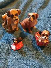 4 Vintage dog Ornaments.1 is M.E.G.1994 dog with postman bag. 1 has L.P.G on it 