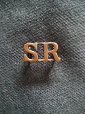 WW1 Cameronians Scottish Rifles SR Blackened Brass Shoulder Title 1882 - 1921