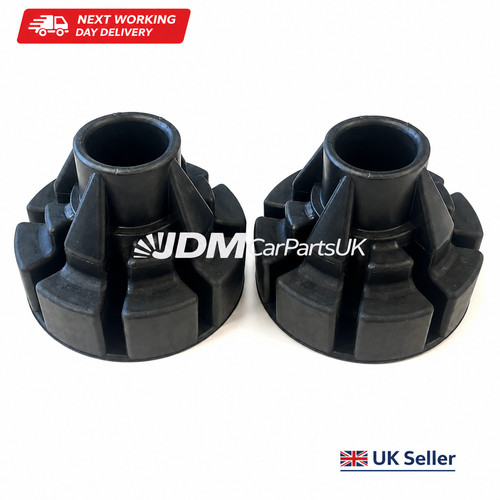 Rear coil spring upper seats - rear,