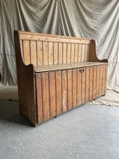 A rare antique 19th century vernacular pine Irish settle bed
