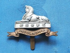 The Lincolnshire Regiment cap badge.