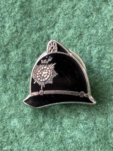 British police helmet - police, badge.
