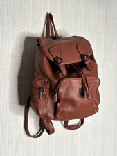 Brown leatherette Coveri Collection backpack with pockets. BNWOT