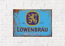 Lowenbrau metal sign, rustic