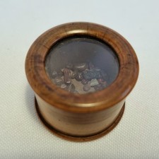 A tiny antique treen specimen