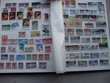 AN ALBUM CONTAINING A MIXED