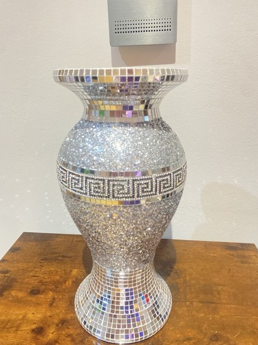 This silver mirrored - , vase