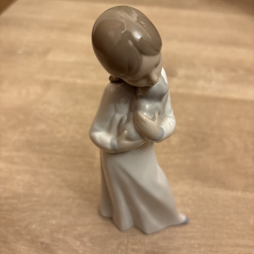 Nao lladro girl holding - by,