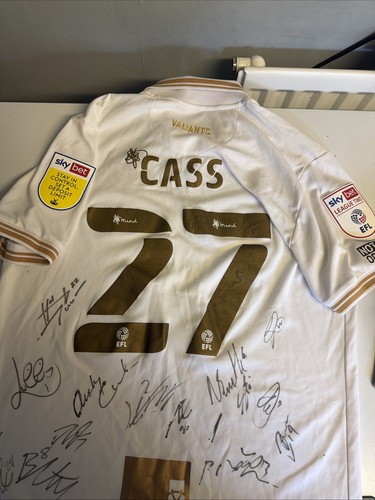 Matchworn and squad signed - and,