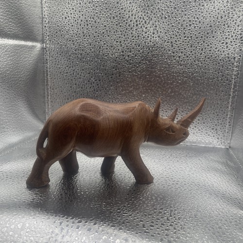 Hand carved wooden rhinoceros - carved,