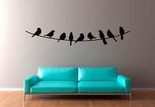 Birds sitting On A Line