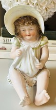 Antique bisque piano baby - bisque,