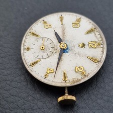 Rolex  Cal 700 Hand Wind Movement complete with Dial and Stem/crown.