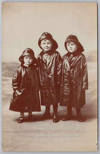 Children dressed oilskins - in,