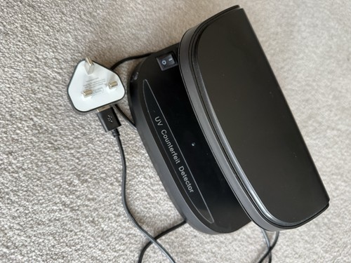 Counterfeit money detector - money,
