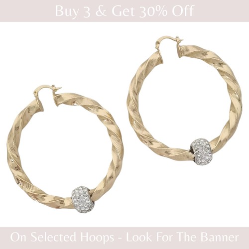 Gold twist hoop earrings with - twist,