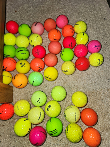 Bright coloured golf - golf, balls