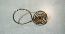 halstatt latene style single swirl bronze fibula