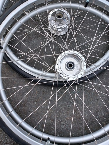 Pair self propelled - propelled, wheelchair