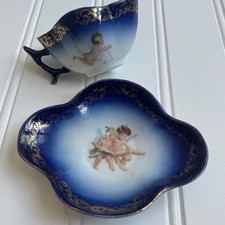 Antique Carlsbad Austria Porcelain Teacup Saucer Set Cobalt Blue Cherub 1800's