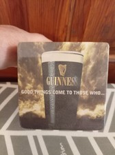 Guinness beer mat - mat,