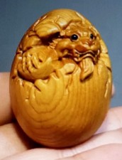 WOODEN hand carved DRAGON EGG