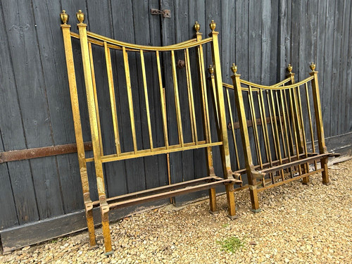 Pair heavy brass beds with - brass,