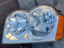JEEP GRAND CHEROKEE 2005-2010 PASSENGER SIDE FRONT NSF HEADLIGHT 55156673AI. 